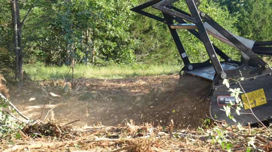 Forestry mulcher working through brush on Arkansas property